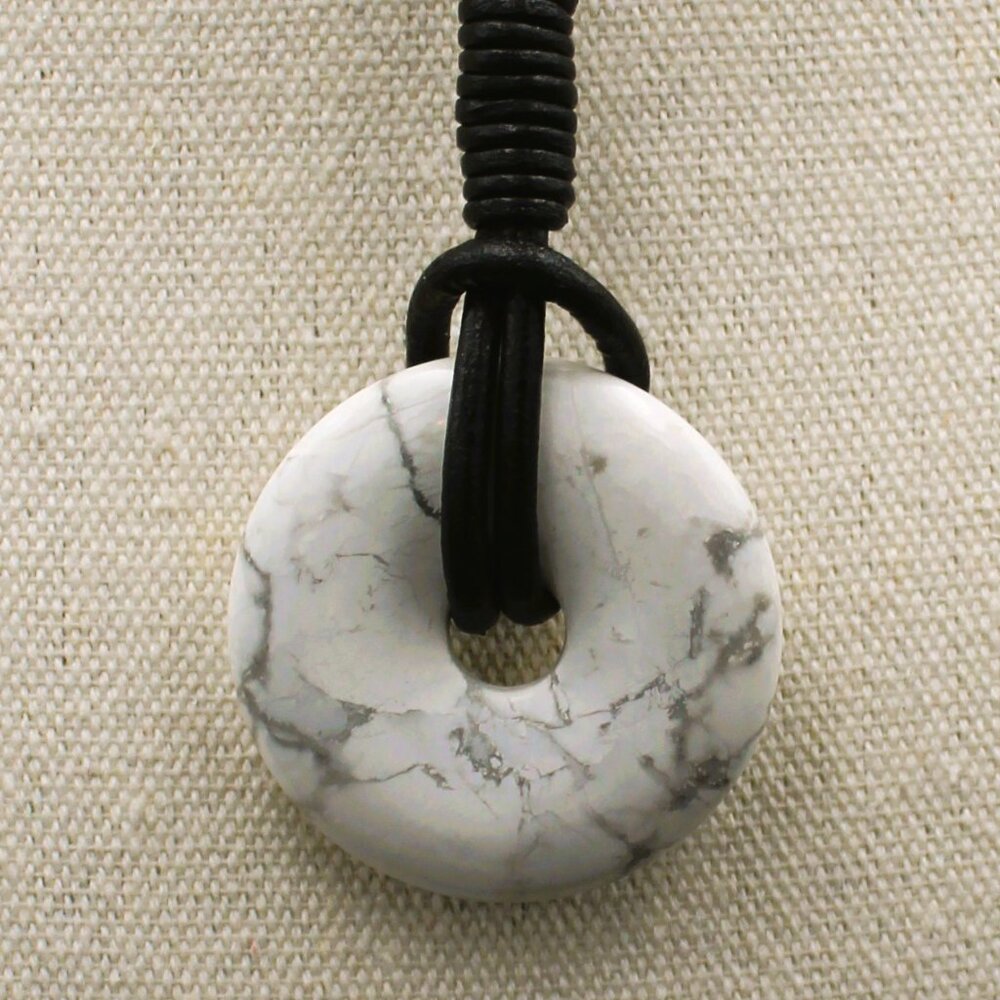 A Beautiful White Howlite Stone Donut with Gray Veins Strung on 3 MM Distresse
